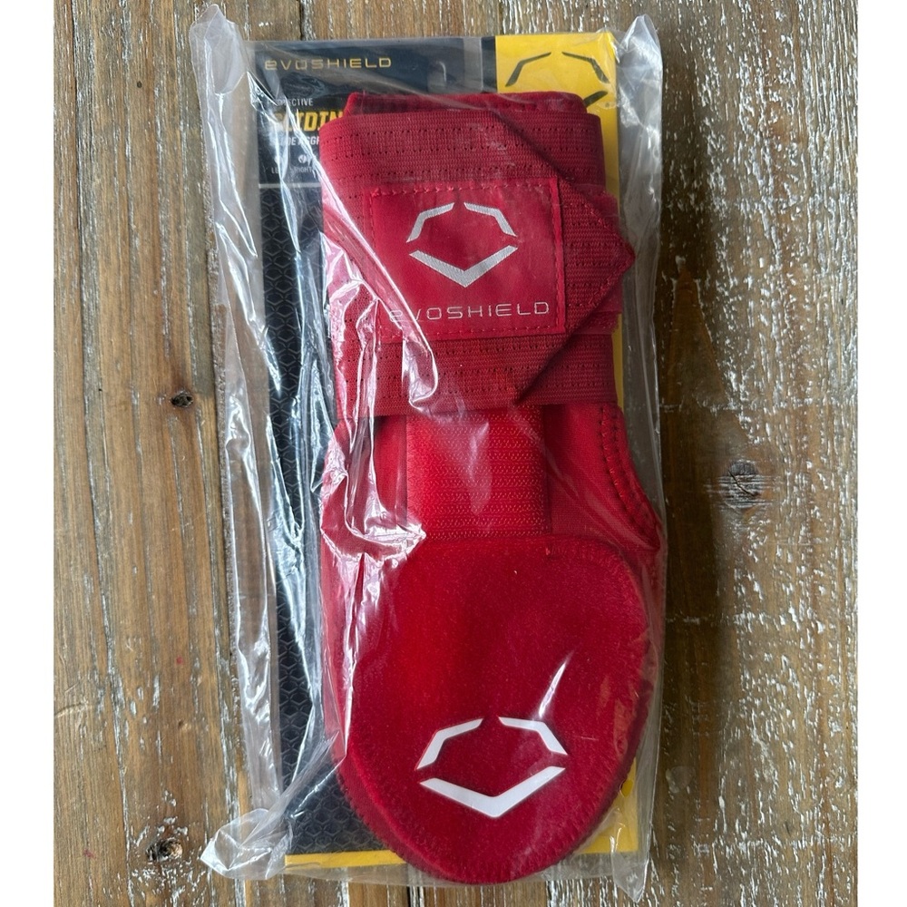 Brand new Evoshield sliding mitt. Right-handed with thumb hole. Red.